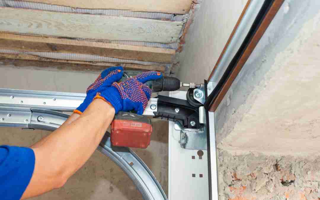 Tech repairing a garage door in Doylestown PA